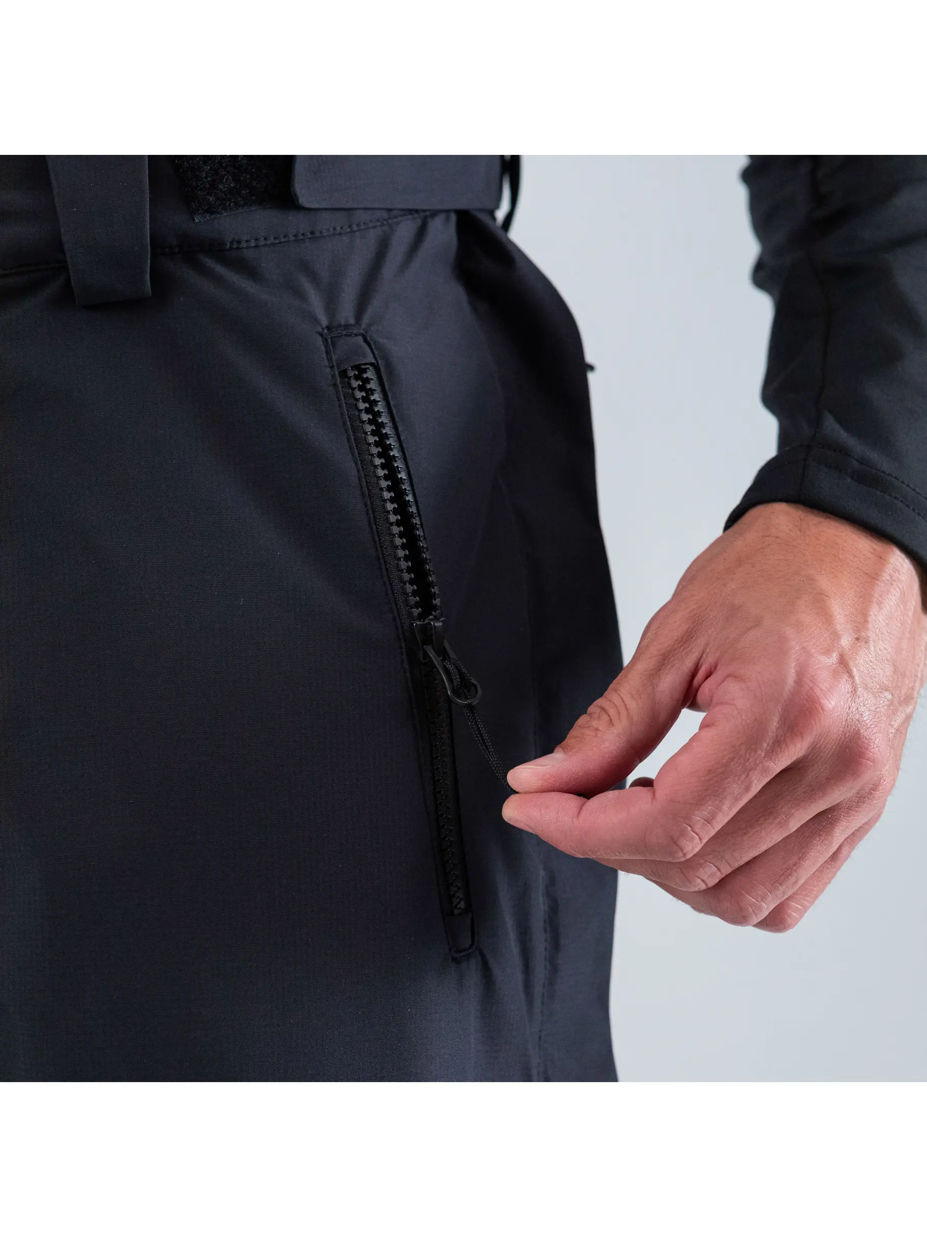 New, view full size image of Front view of Product detail - RACE ZIP Pants Unisex black